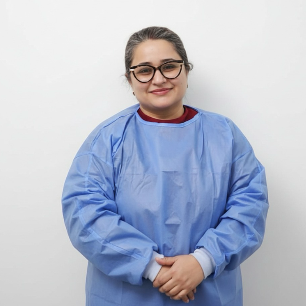Dr. Divya Sharma, a dentist.